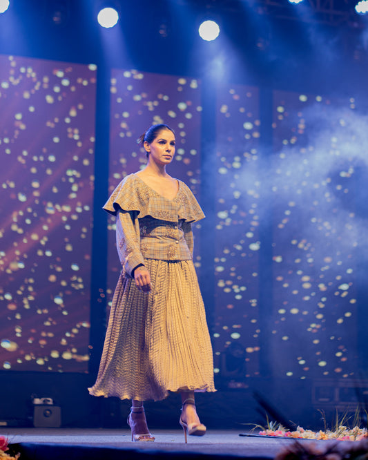 Blossom Elegance Skirt in pleated satin, tailored midi skirt styled on runway