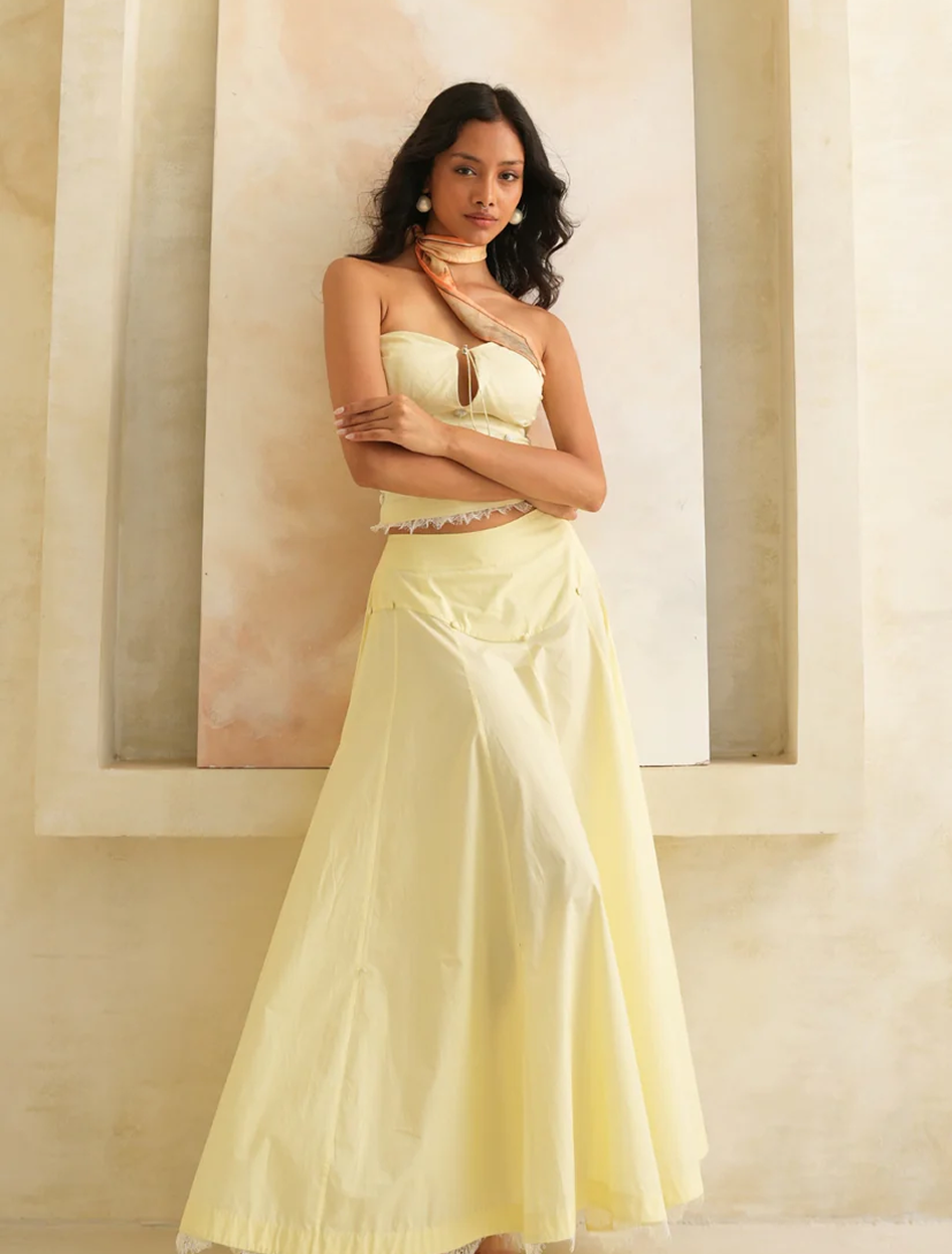Pastel Yellow Skirt showing flared maxi drape in pale yellow