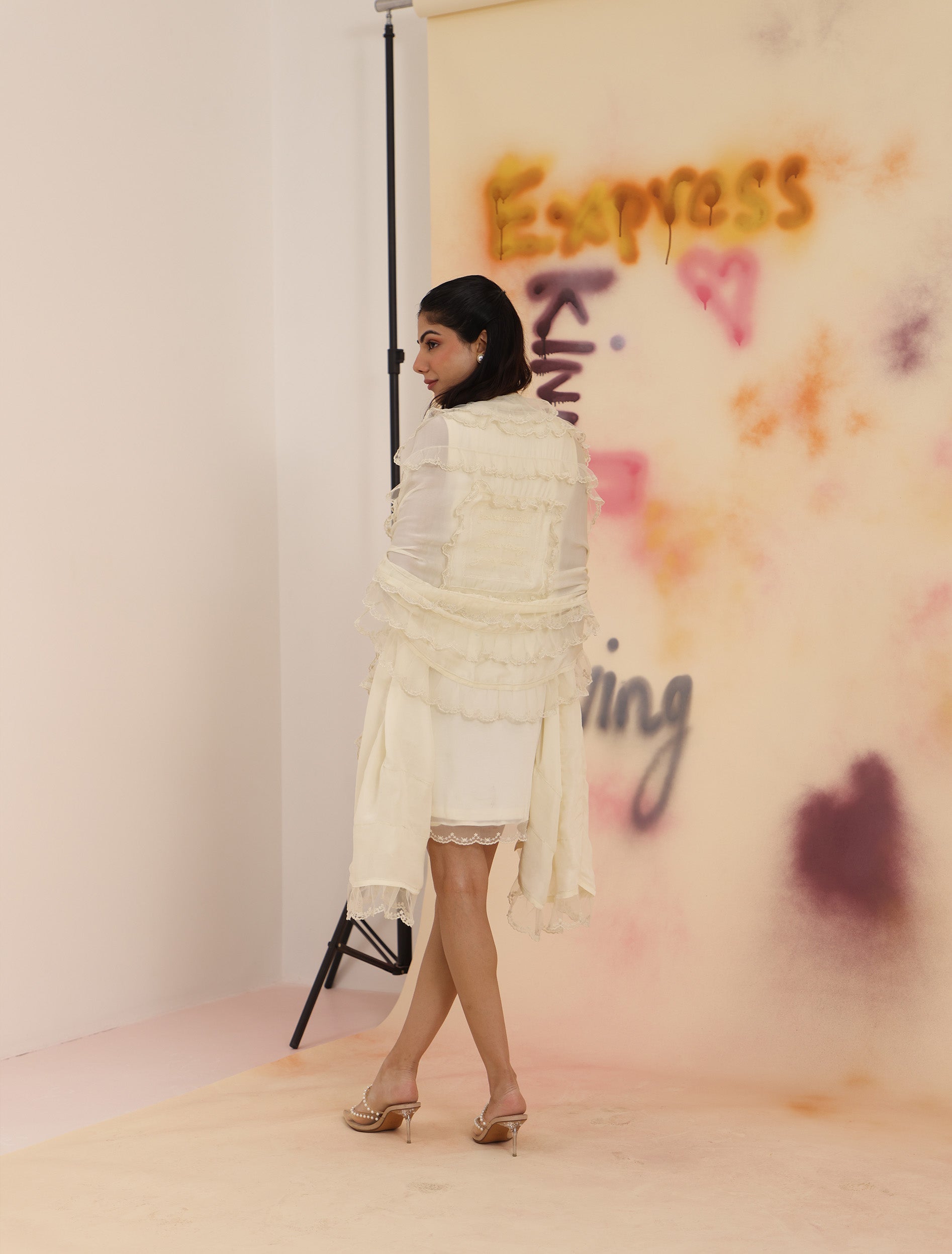 Ruffled Scarf - Cloud Dancer styled as draped overlay in ivory sheer fabric