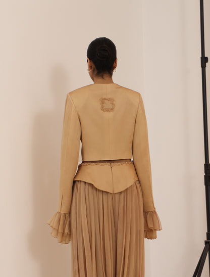 Back view of Ruffled Cuff Napolean Jacket - Toasted Almond with cropped tailored fit